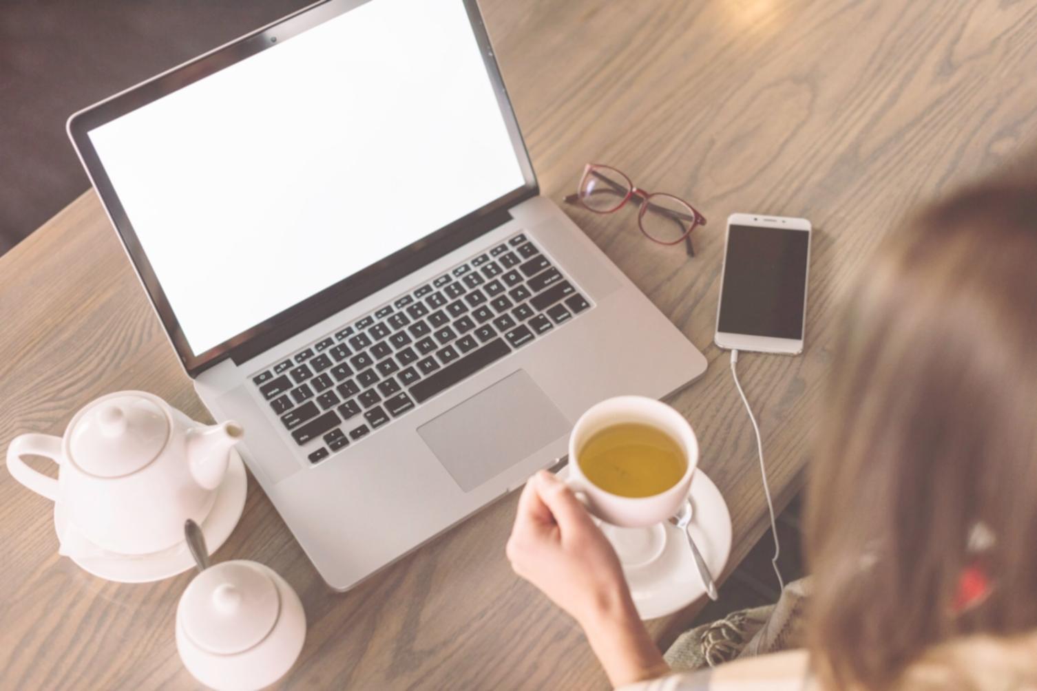 Modern financial analysis workspace with market data displays and investment research materials